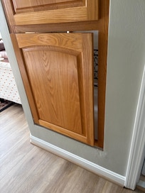 Broken cabinet, hanging off hinges
Not closing