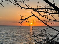 Sunrise, as we were leaving to go home…calling us to stay one more day! Taken on Plantation Rd that takes you to the condo