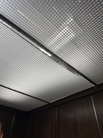 Only 1 elevator and the ceiling is falling off