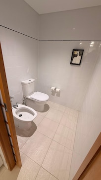 Main Toilet with bidet.