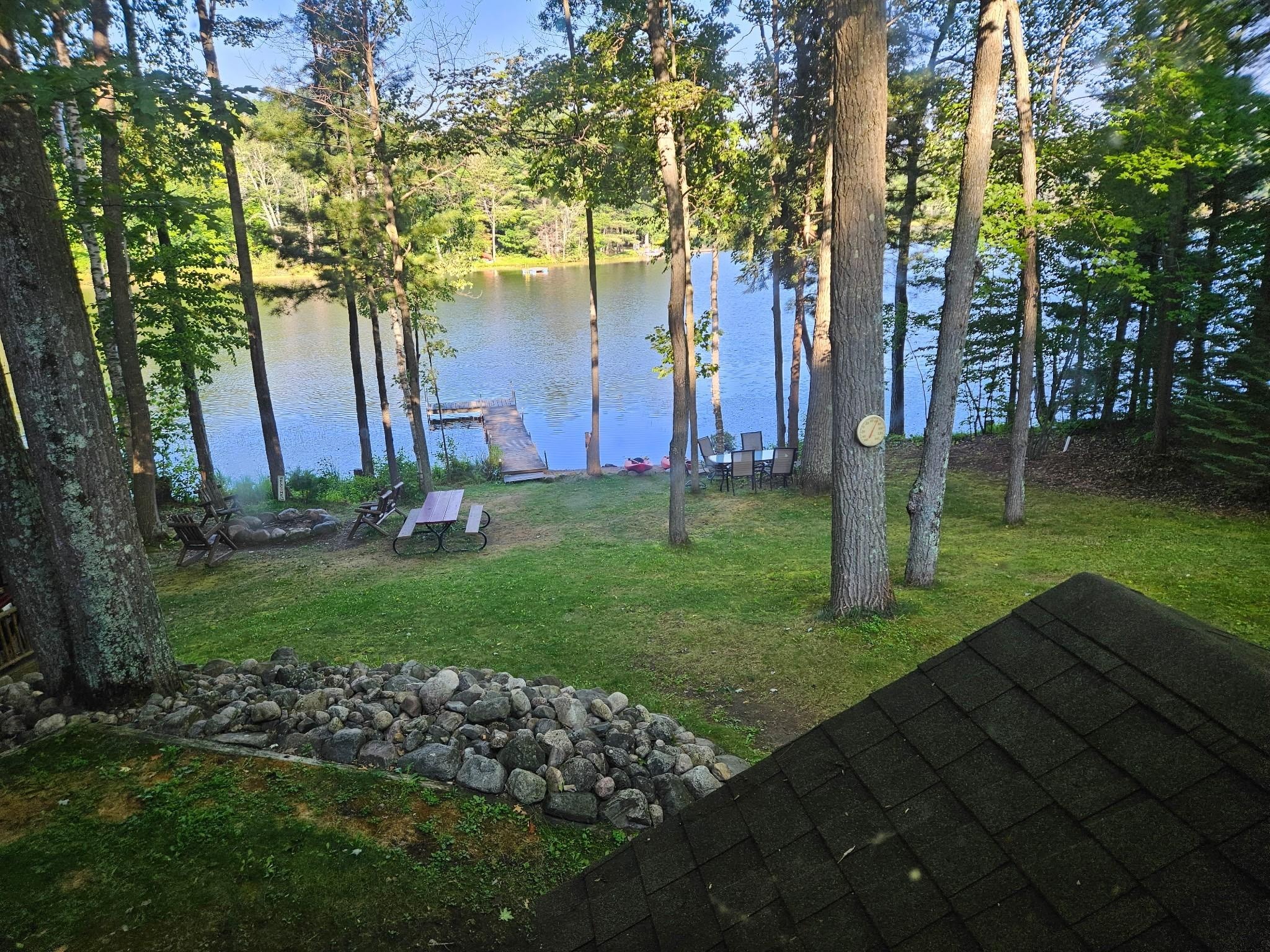 View of beautiful Mirror Lake taken behind home.
