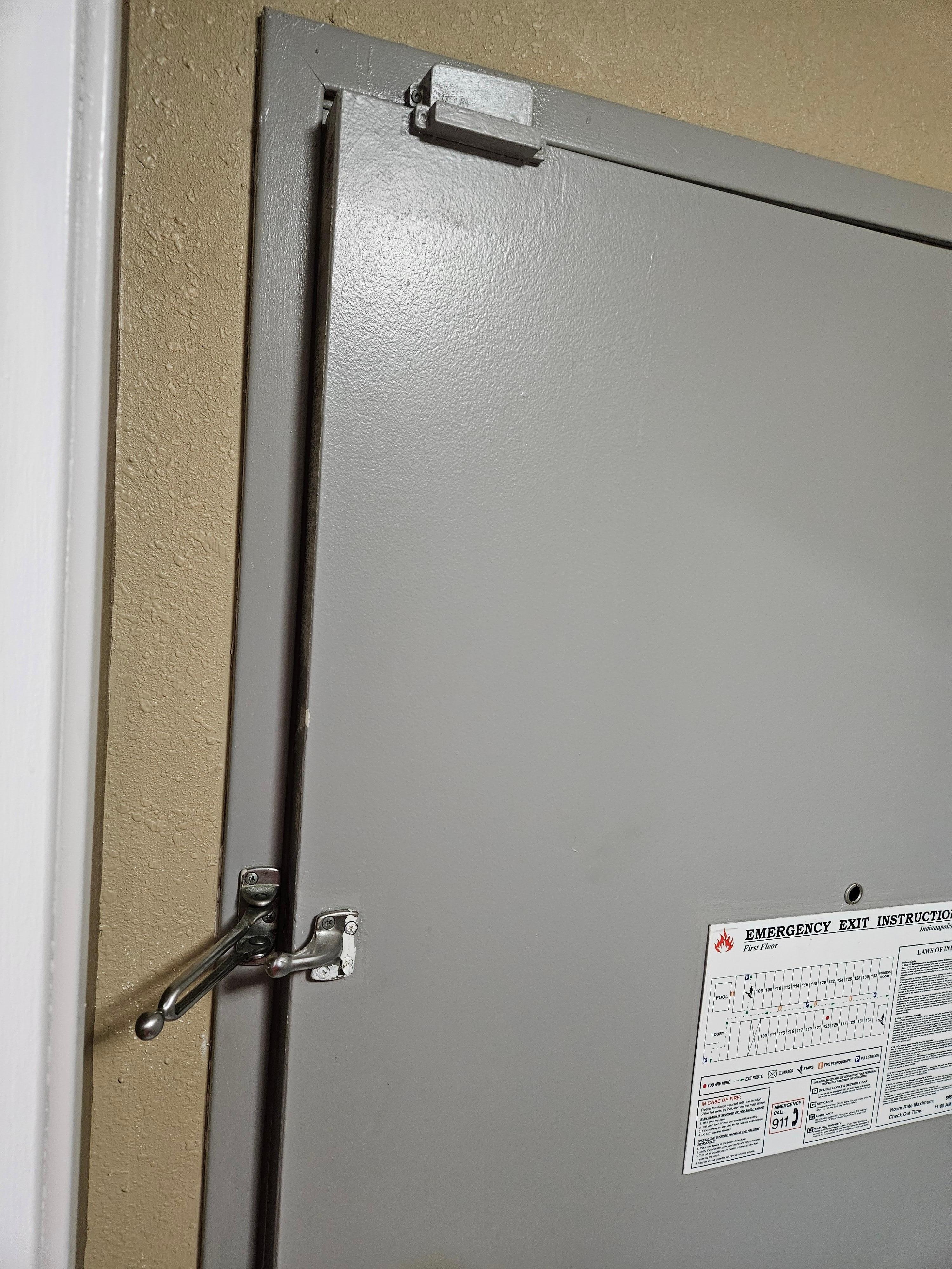 Door closeup, needs repair, when asked to be moved so I could feel safe, they told me it was full, only 5 cars were out there