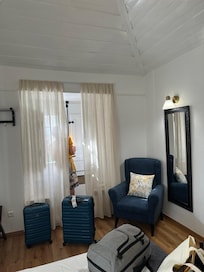 The walls are so thick the curtains hang feet from the shutters.