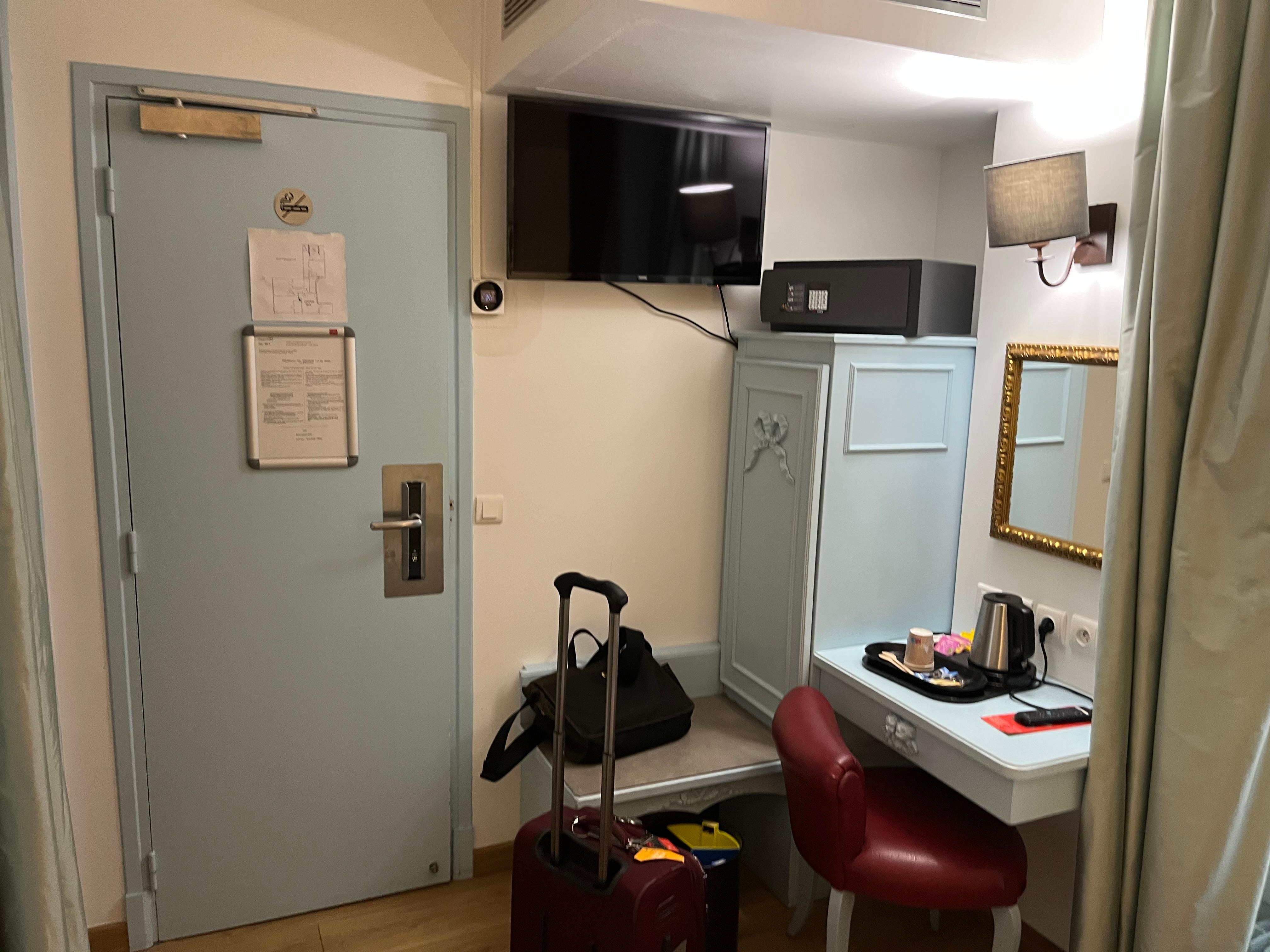 Room has a small mini-fridge with complementary water.