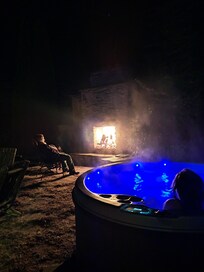 Hot tub and outdoor fireplace