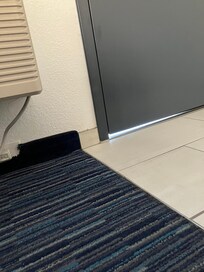 Large gap under door lets in noise