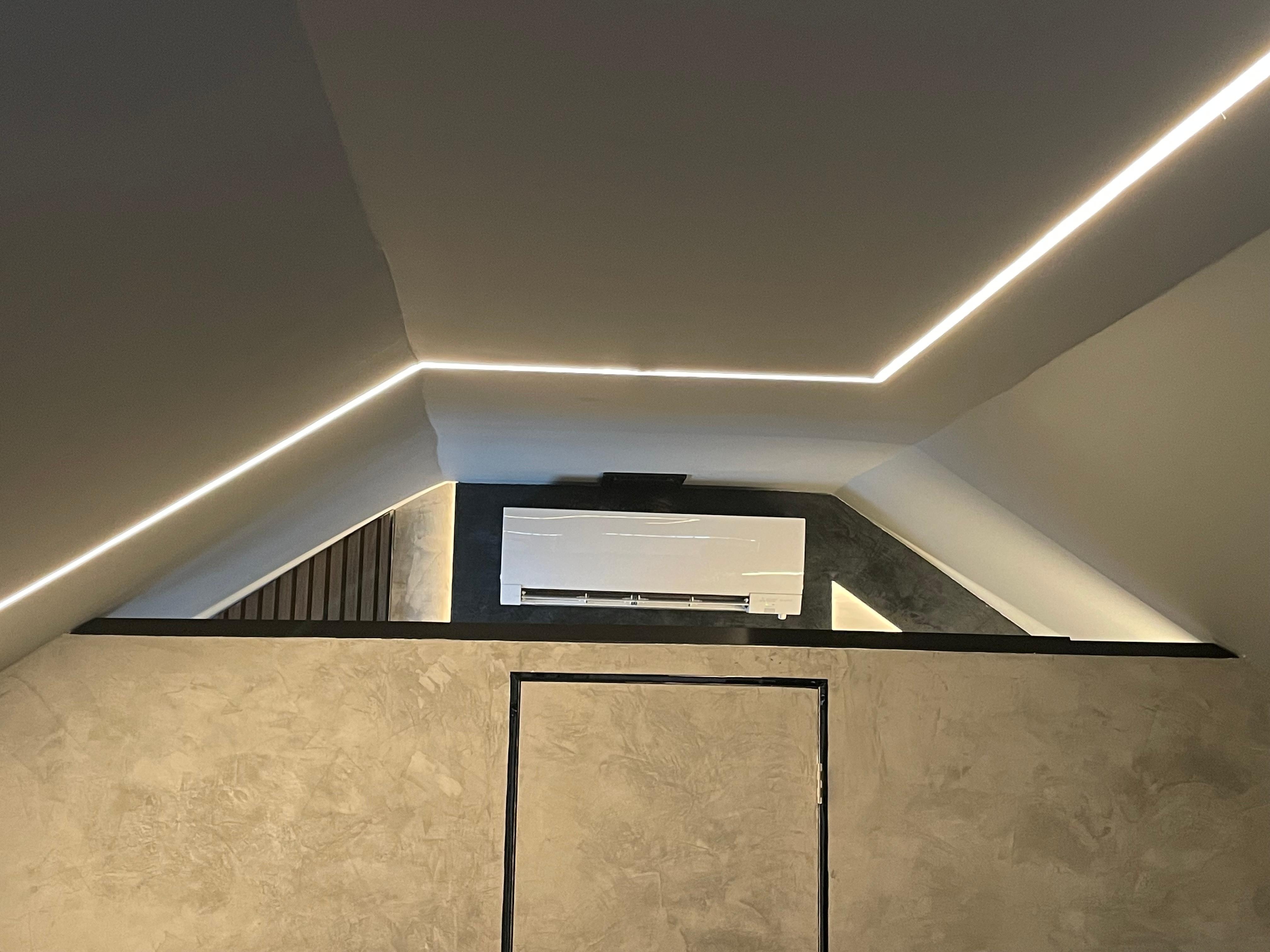 Bathroom cut out in main area- open area with heat/ AC in bathroom with bathroom vent directly overtop of the heater/ AC 