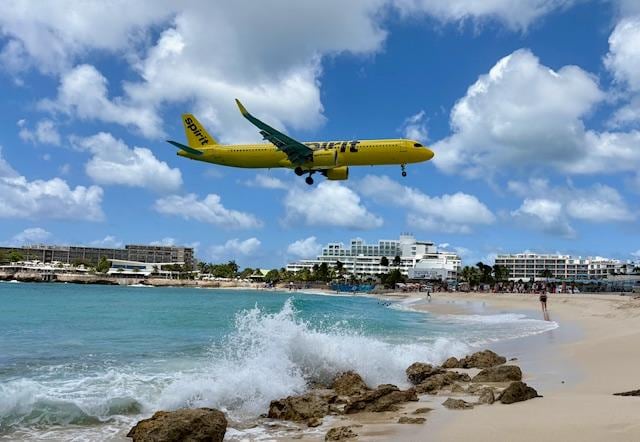 Maho Beach.  Easy walk to the end of Simpson's Bay Beach, exit at D's Beach Bar and walk along the road to see the planes land.