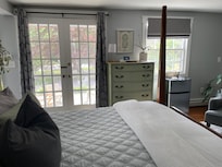 view from bed to French doors