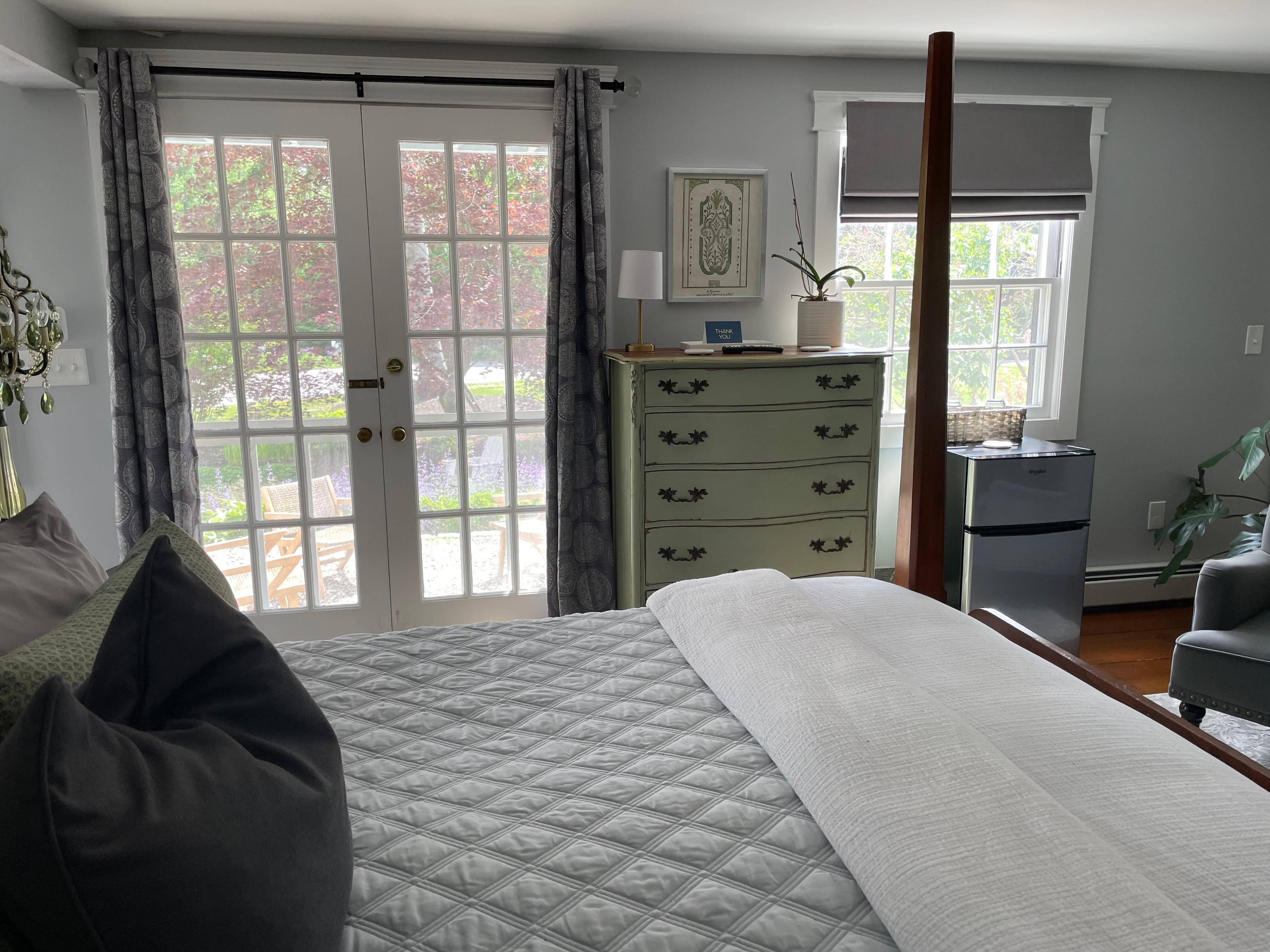 view from bed to French doors