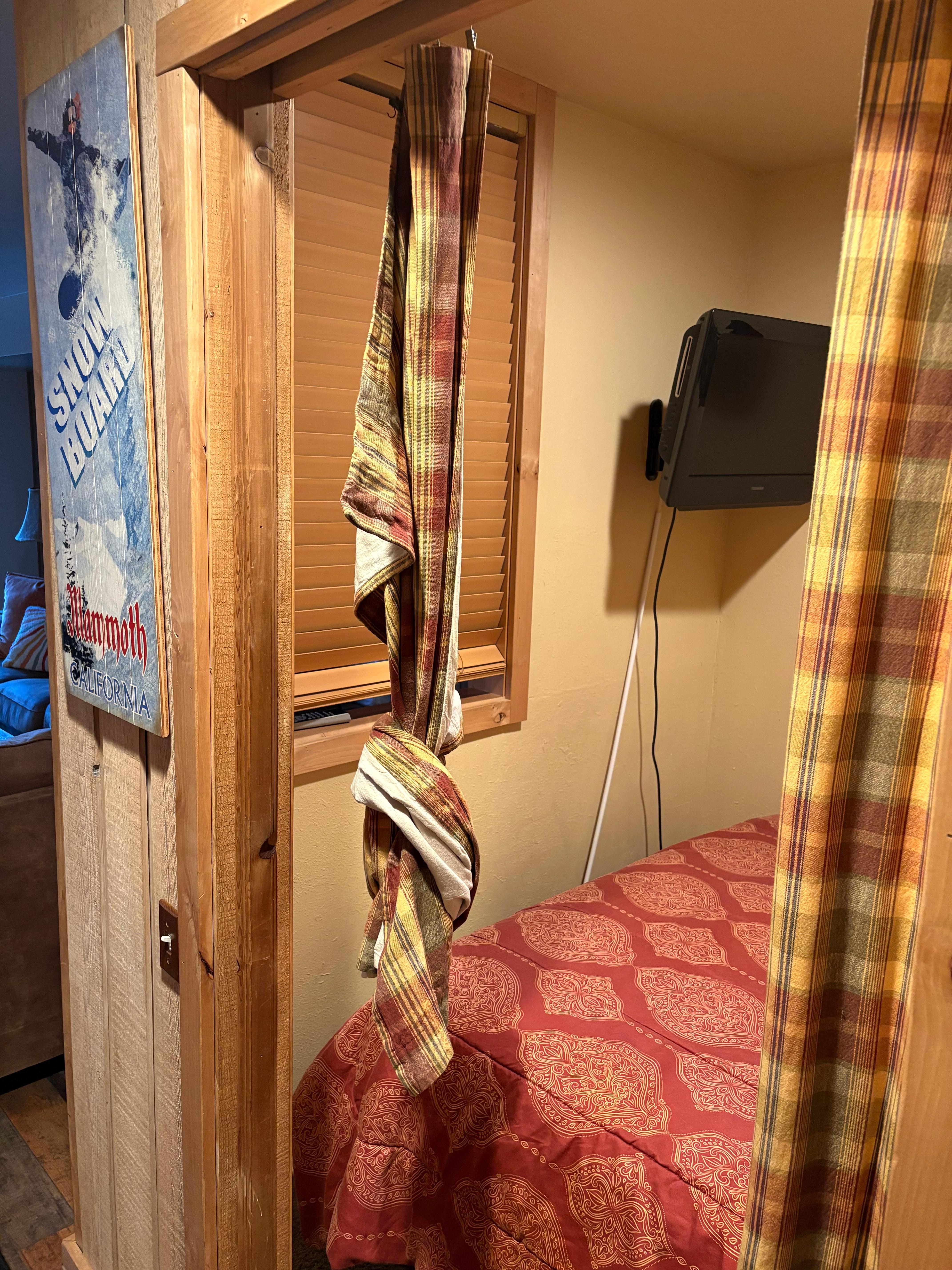 Curtain in extra space.  Not a bedroom