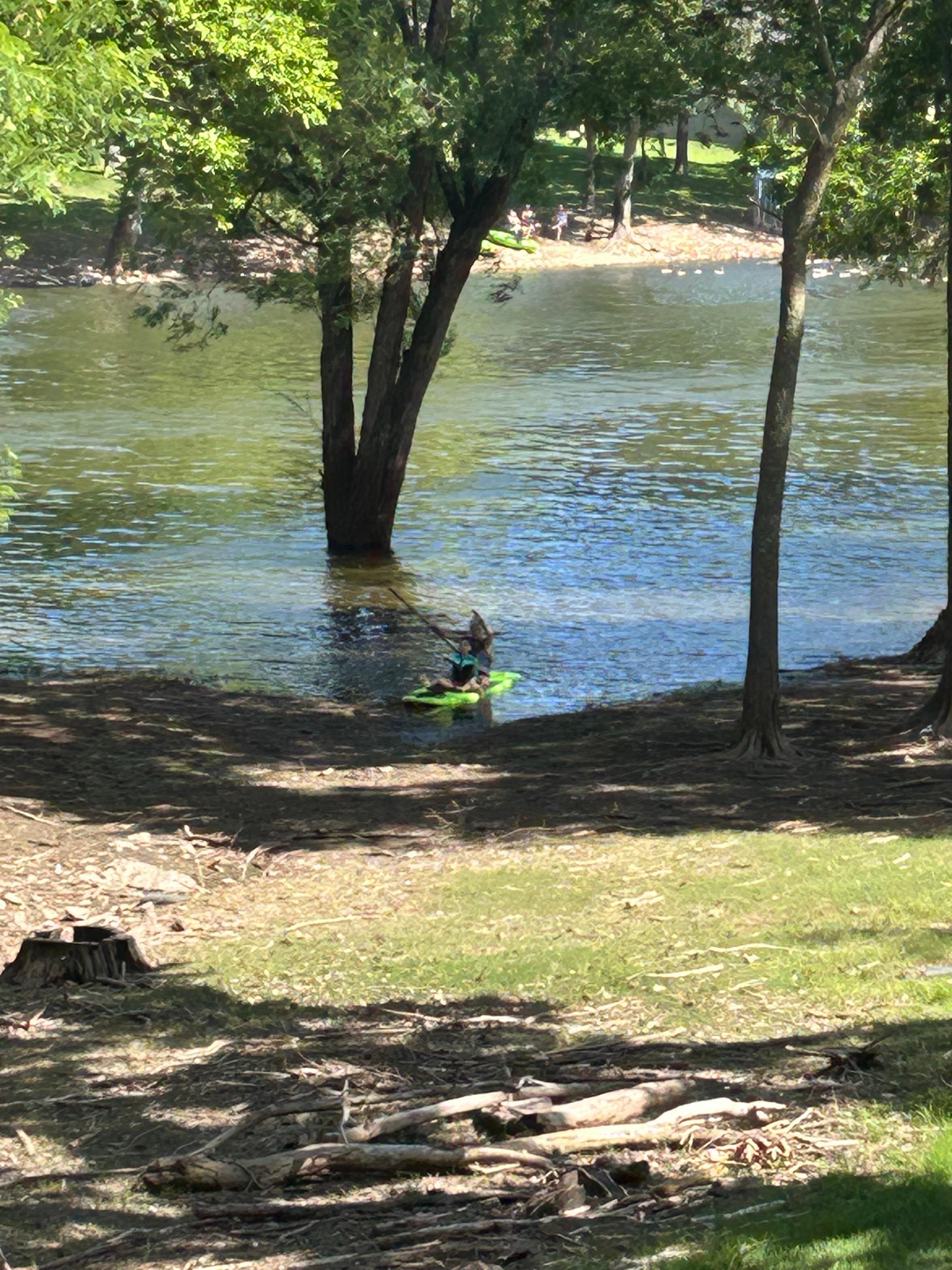Photo taken from upper back deck, easy access to the water for kayaking/fishing. 