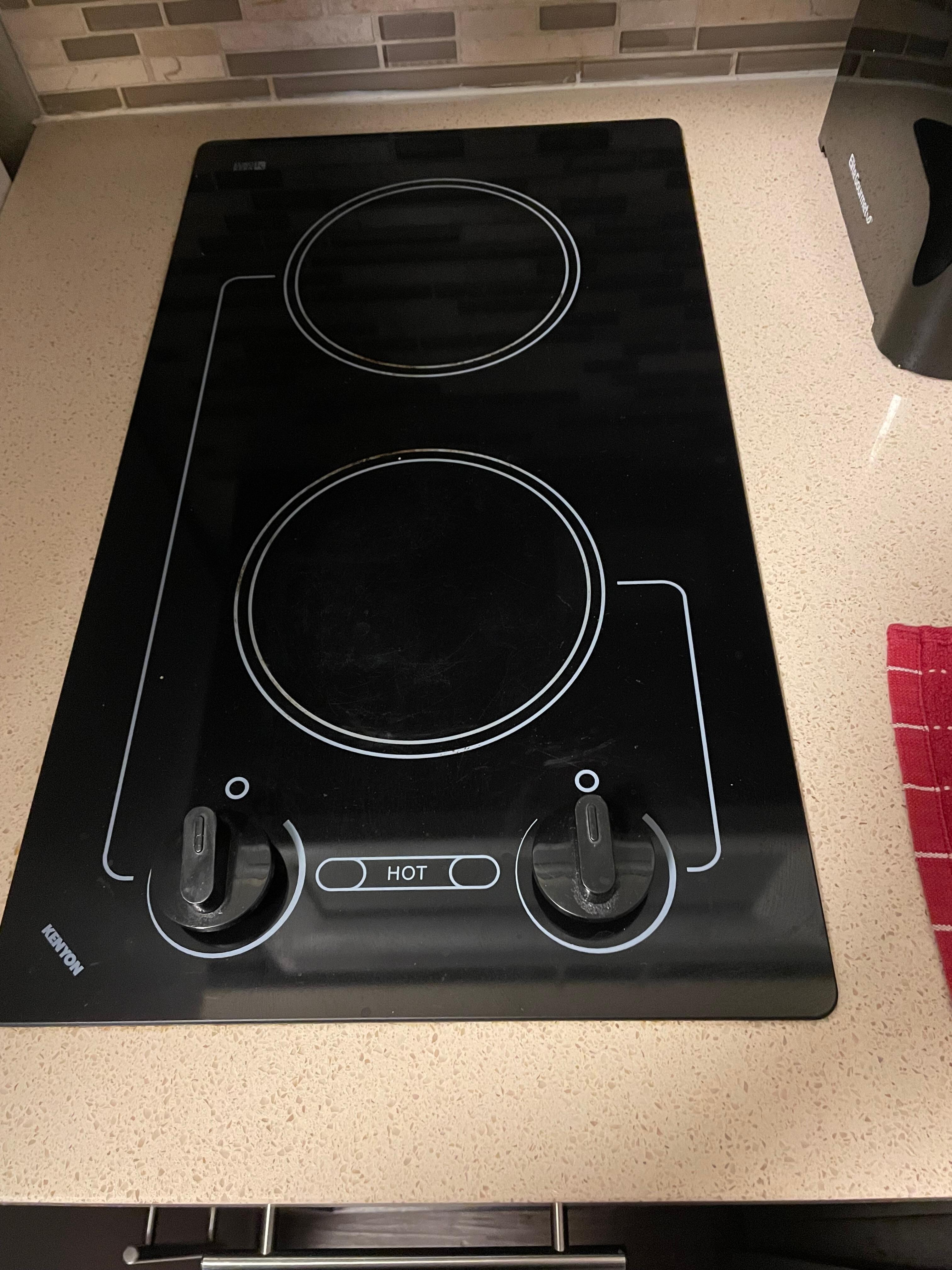 Small two burner stove that is too small for two pans at once 