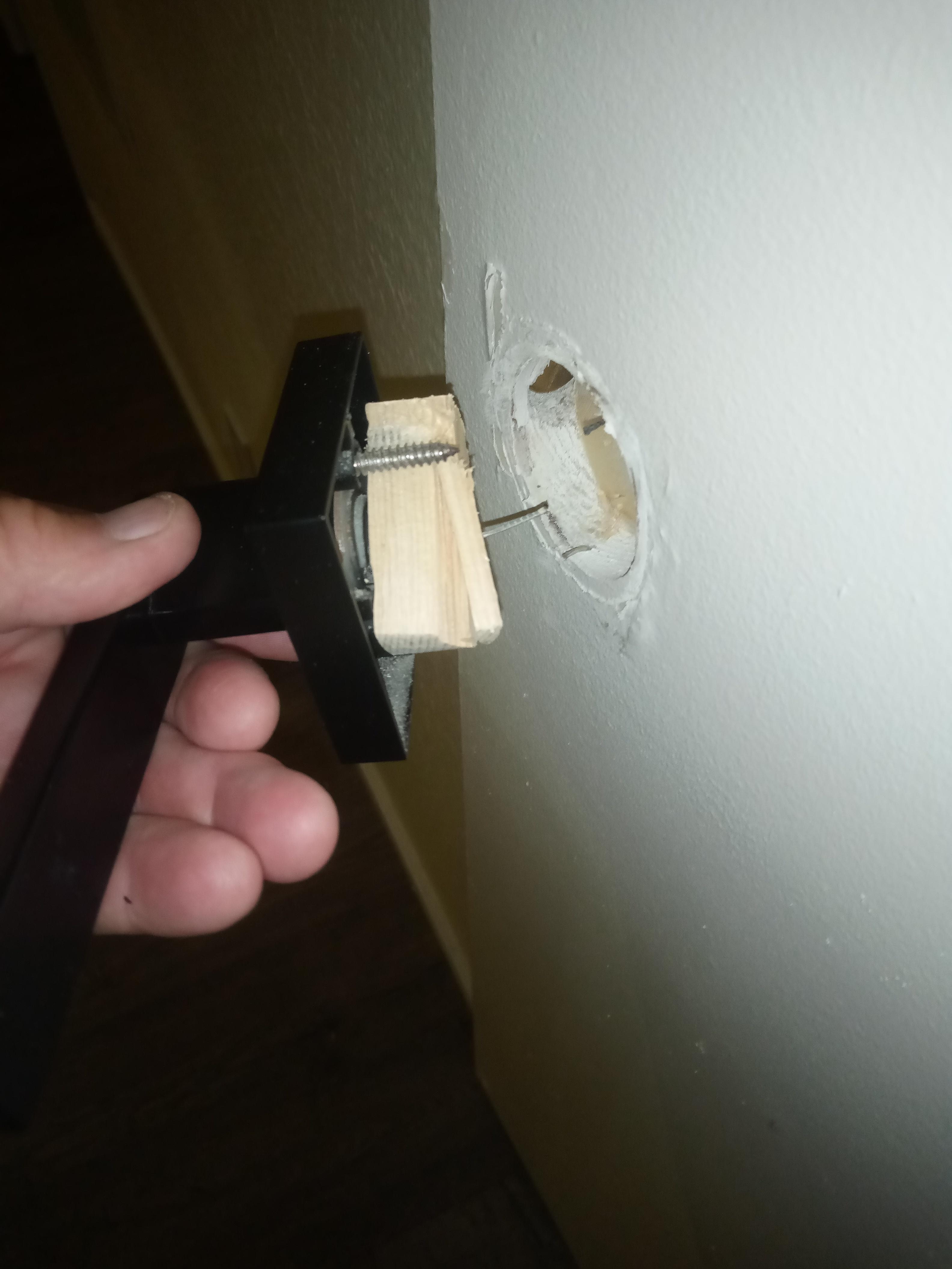 door handle pulling out of door