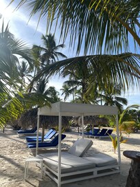 Beach cabanas and lounge chairs all available