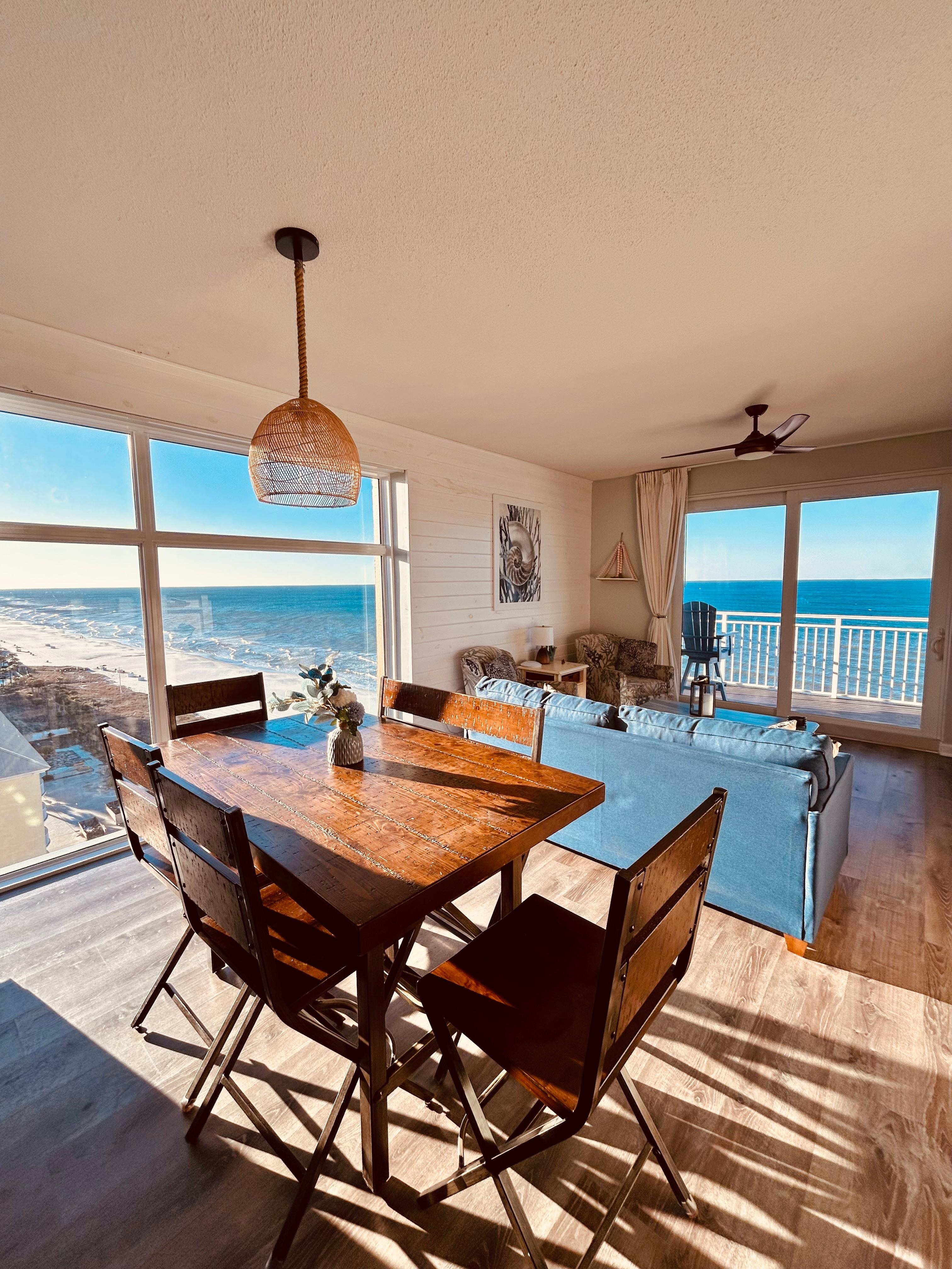 Beautiful morning sunlight flooding into the floor to ceiling window. 