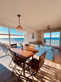 Beautiful morning sunlight flooding into the floor to ceiling window.