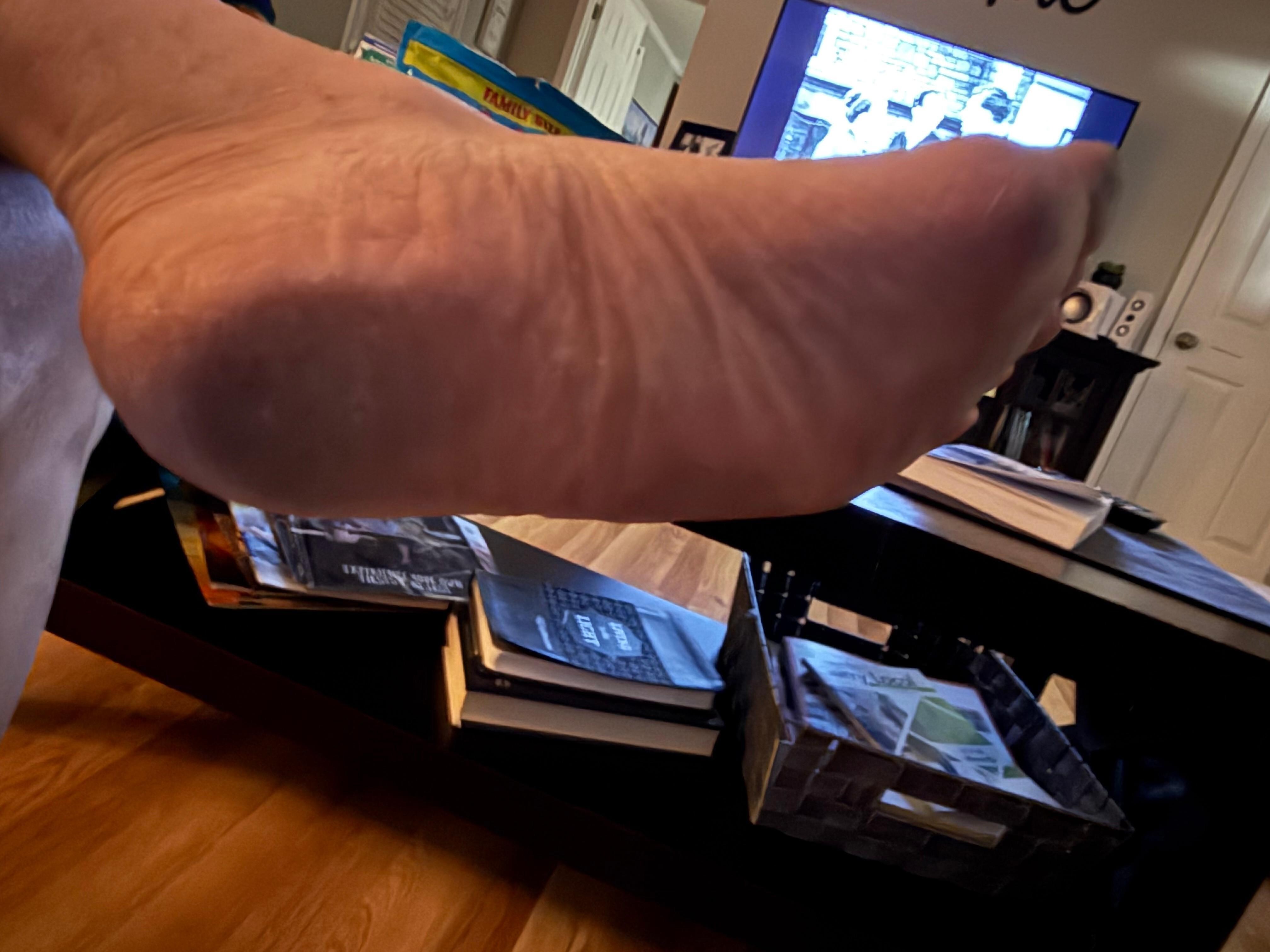 Sole of husband’s foot after a shower and walking barefoot through the house.
