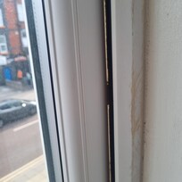 Gap in window frame which caused a draught and noise
