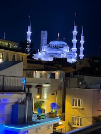 Exquisite night view of Mosque from balcony.