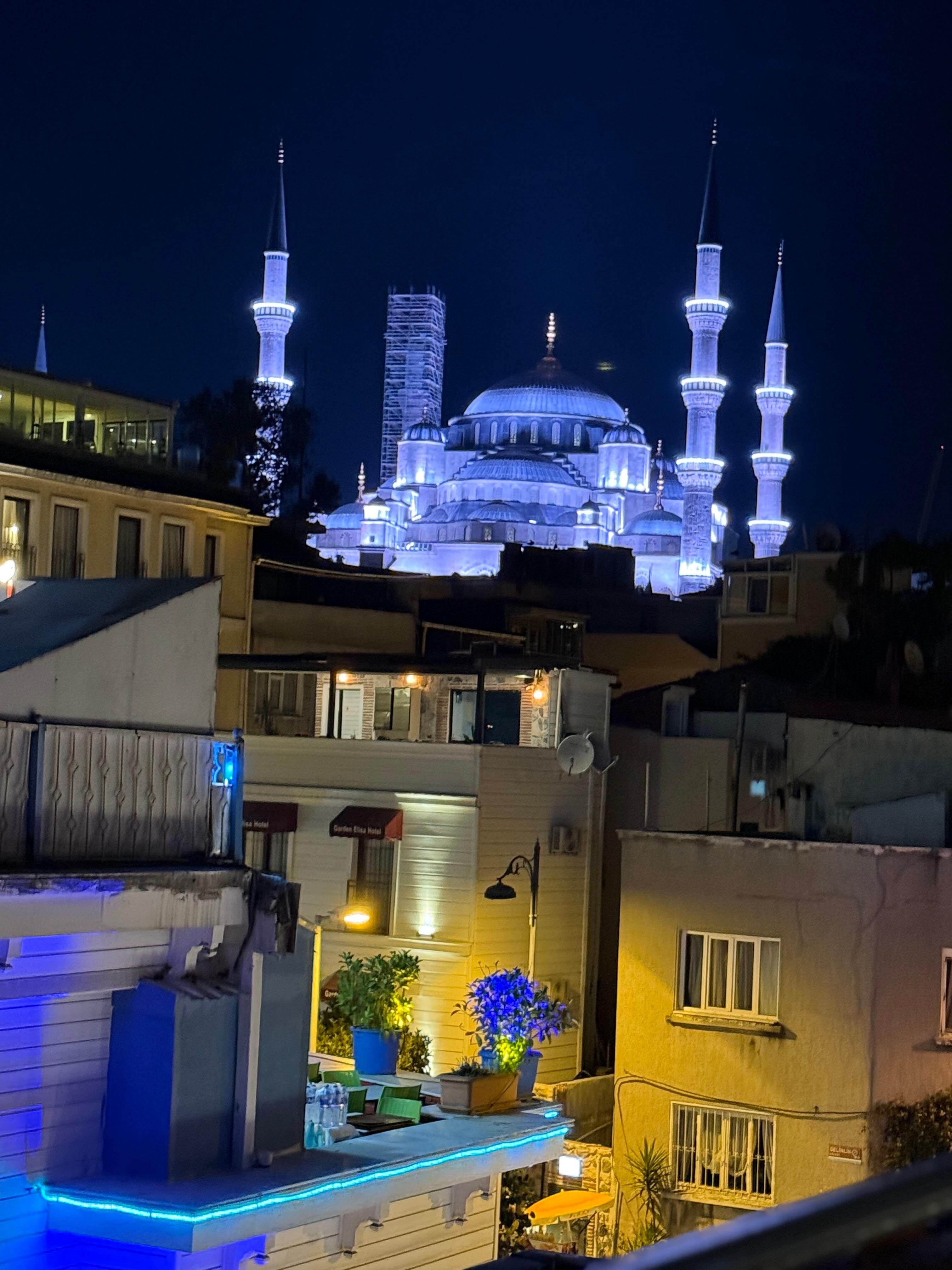Exquisite night view of Mosque from balcony.