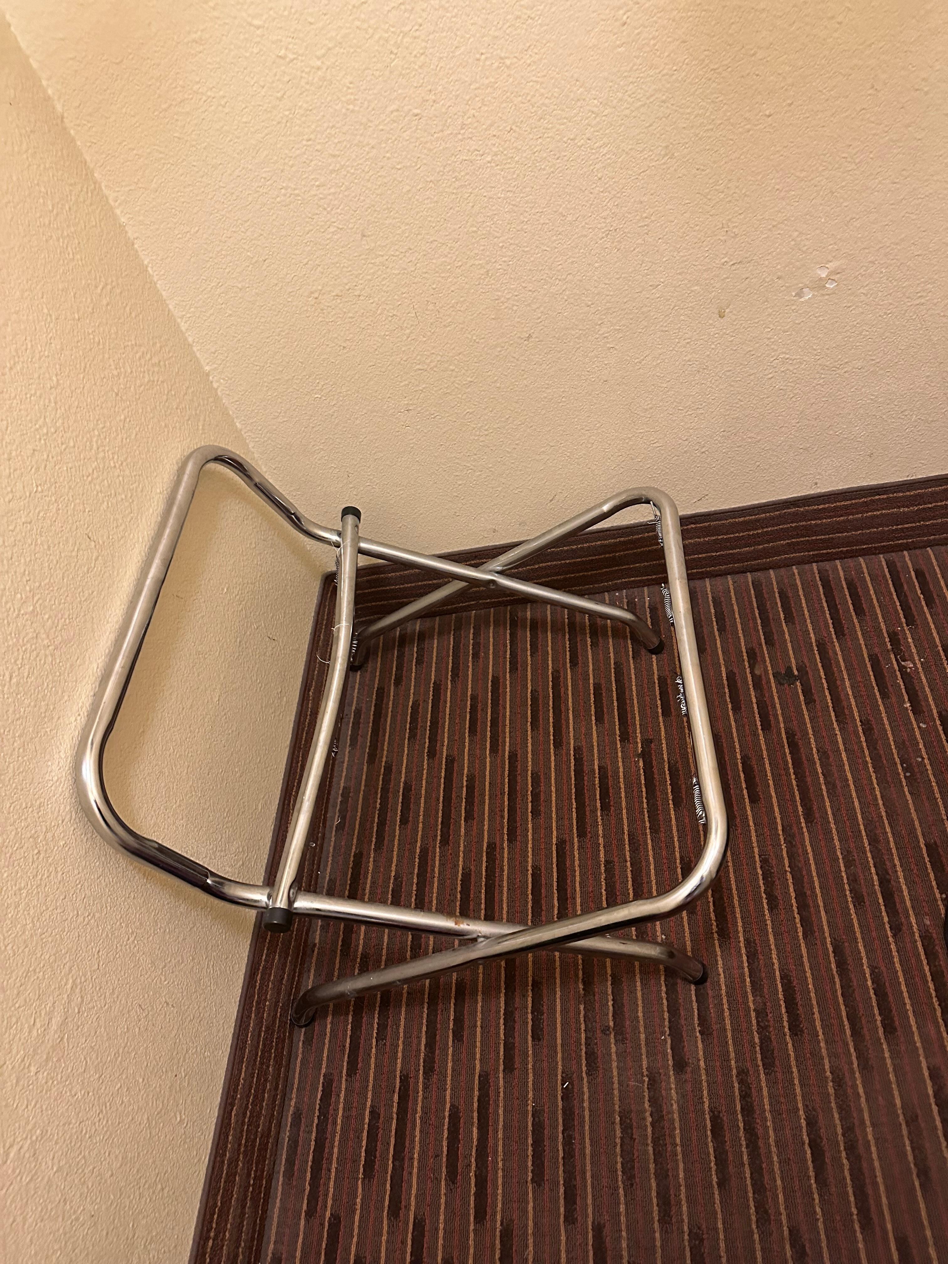 Luggage rack without straps to hold luggage!  
