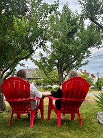 My sister and I enjoying the front yard.