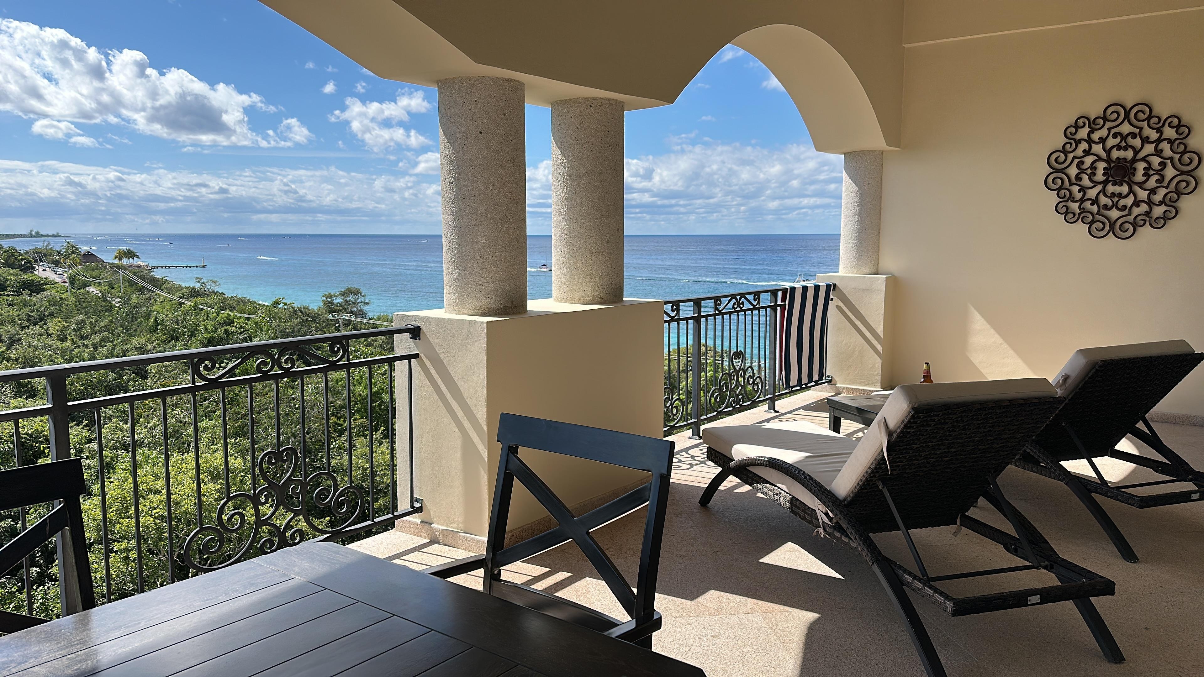 Outside deck with comfortable chairs and amazing view!