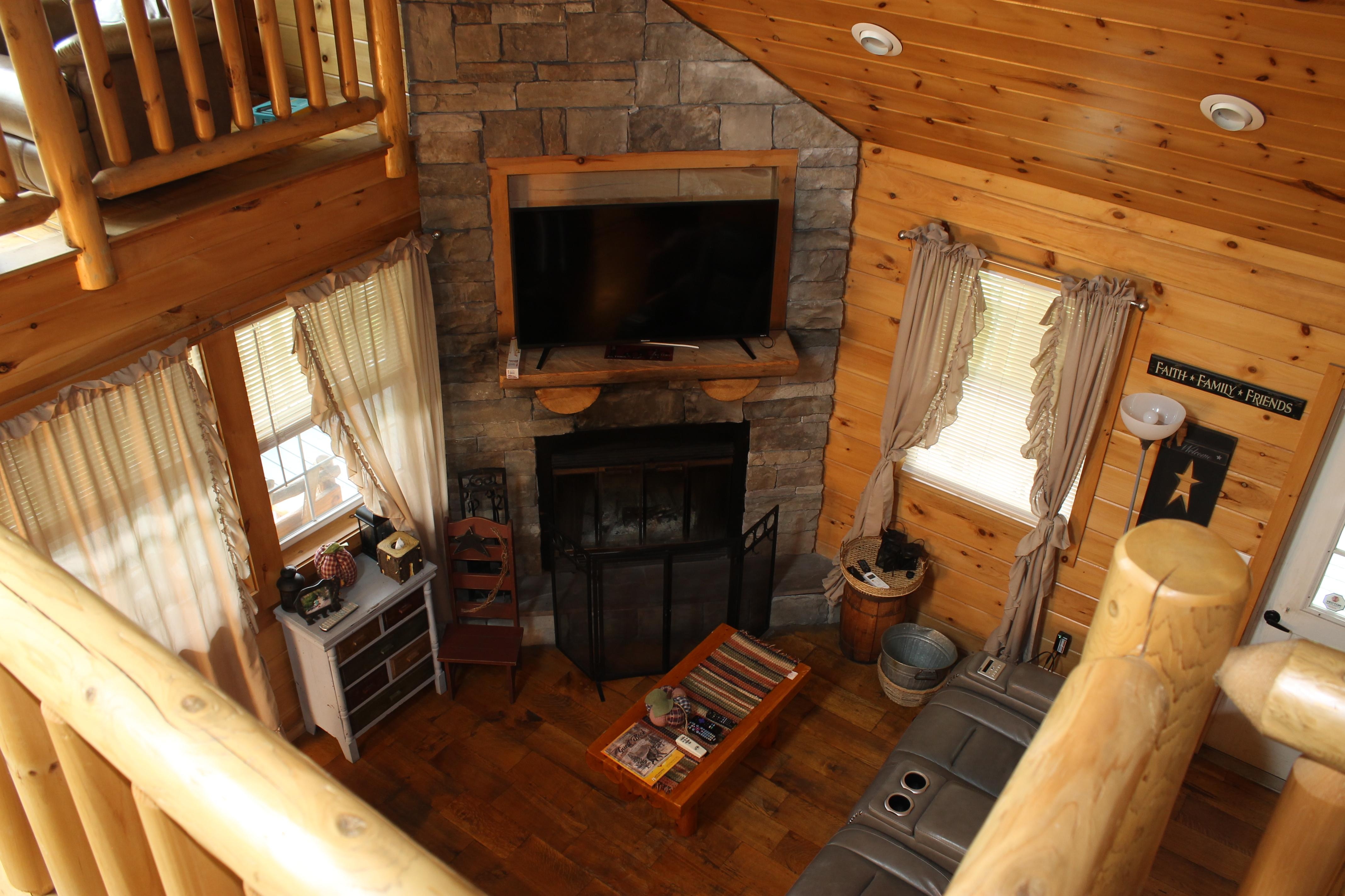 View from top of stairs into living room
