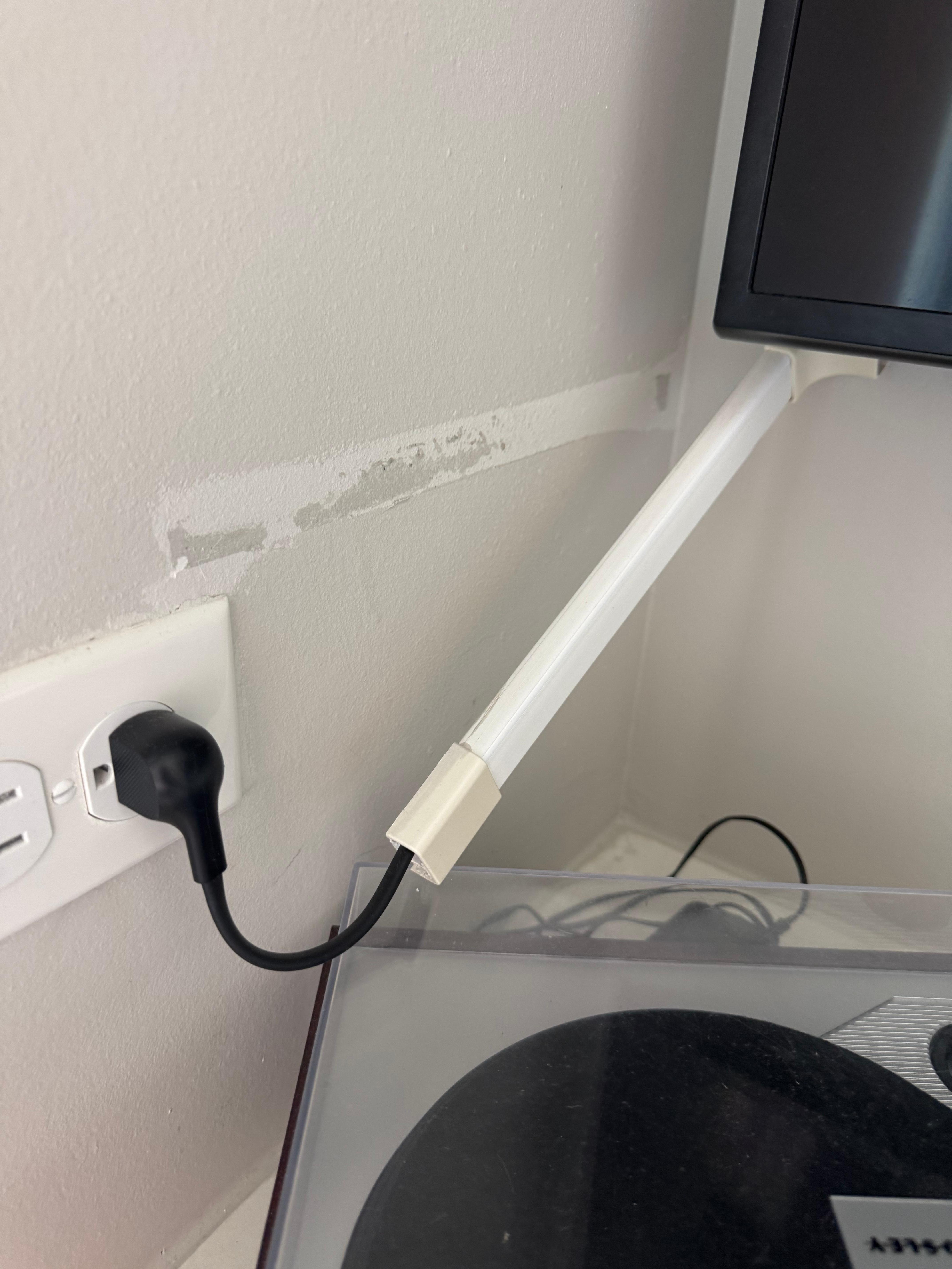 Cable covers coming off the wall.