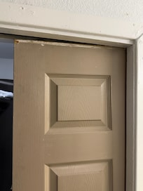 Bathroom door had come off the track.