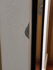 broken plaster on wall
