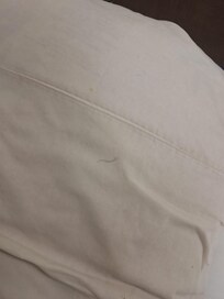 Dirty linen. Cigarette holes