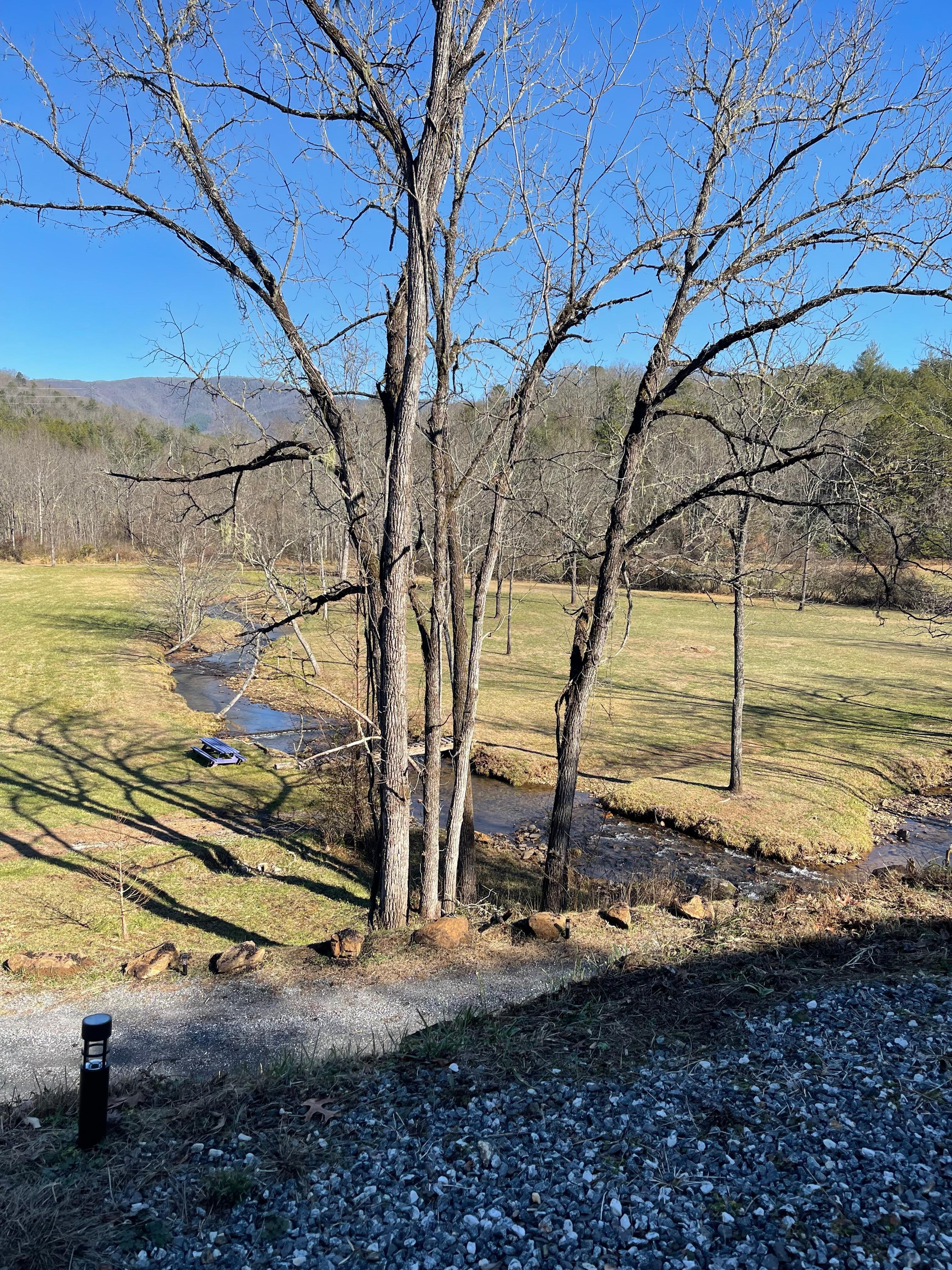 view of open field and creek