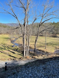 view of open field and creek