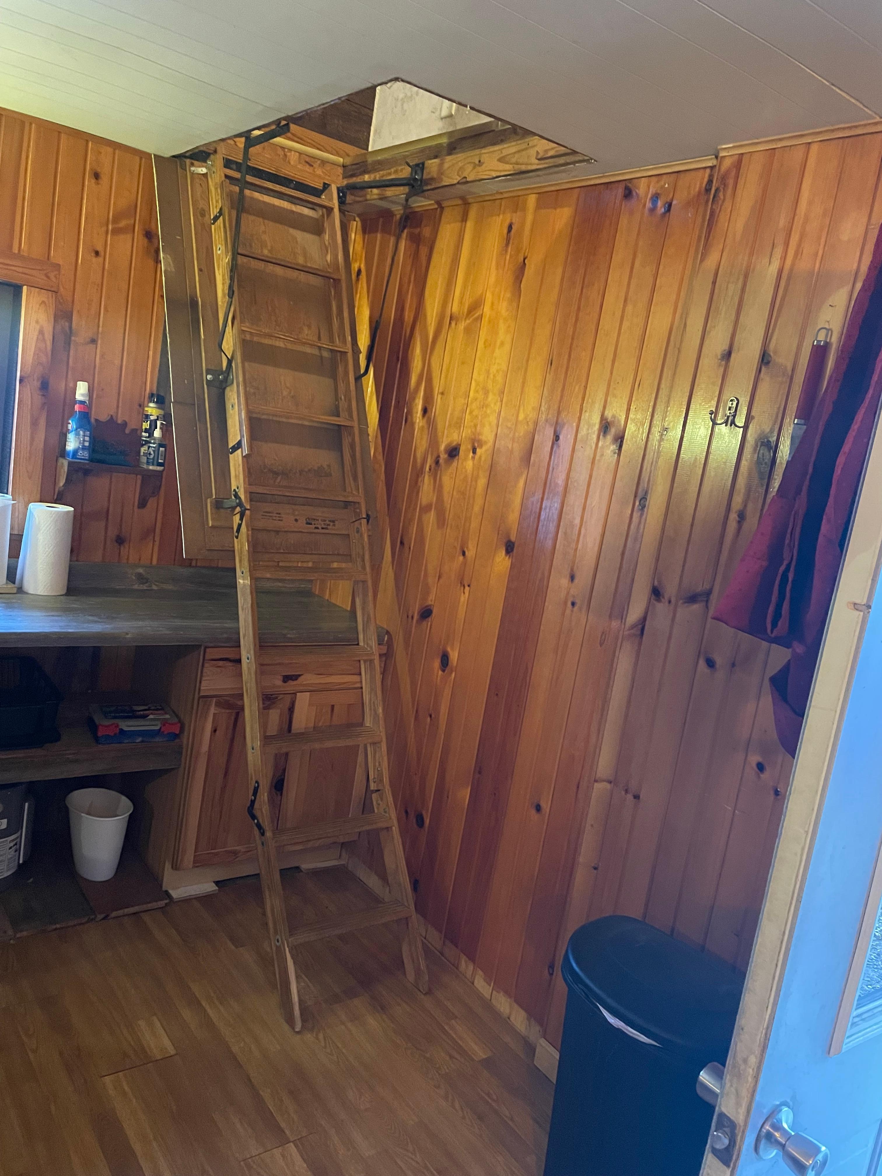 Drop down stairs to get to the bedroom.