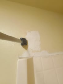 Rod falling out of wall