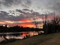 View of the sunset while walking the Greenbelt located at the house.