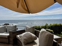 Huge umbrella that is easily moved around to provide shade on the patio