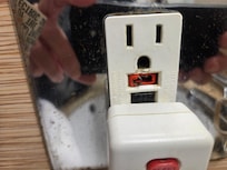 Damaged outlet in the washroom