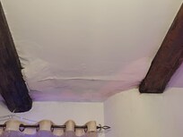 damaged ceiling from repeated leaking