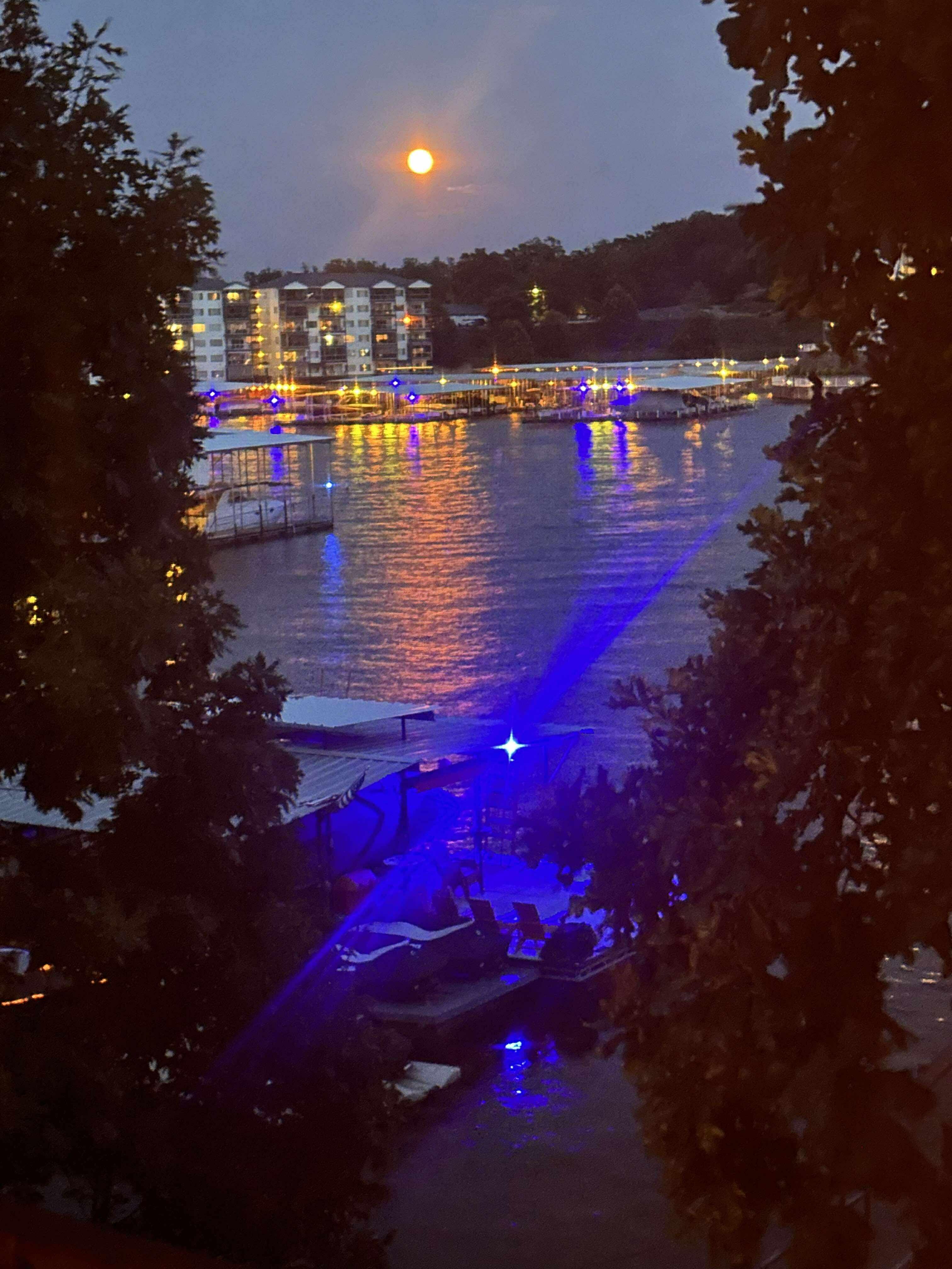 View of the screened in bug free deck at night.