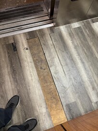Tile missing in the elevator.