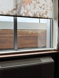 Terrible view of a carport roof from the only window in the room. Lol