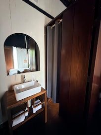 Curtain instead of door for bathroom. Not a major issue but would’ve preferred a more private bathroom.