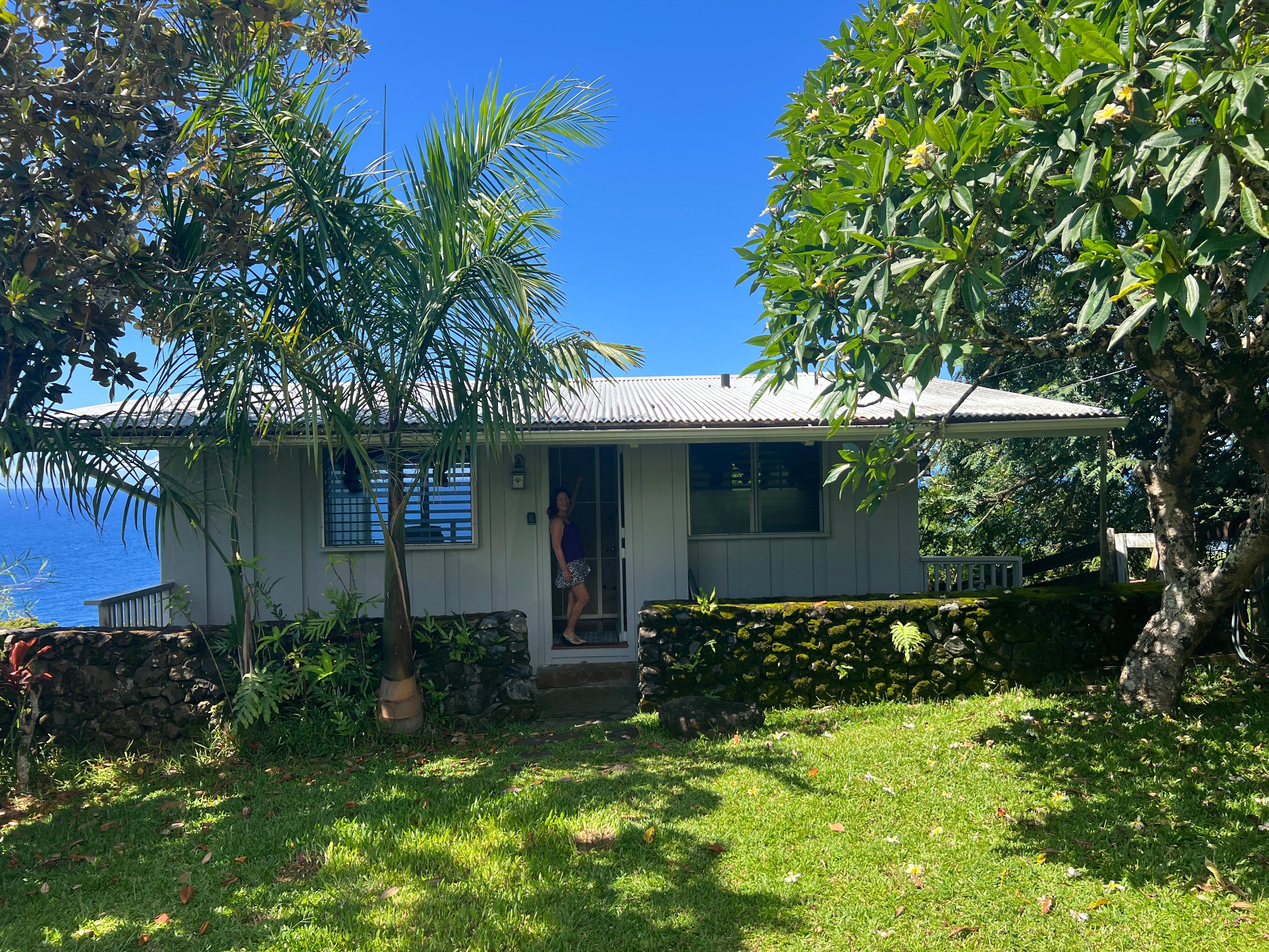 The front of the cottage facing the road. 