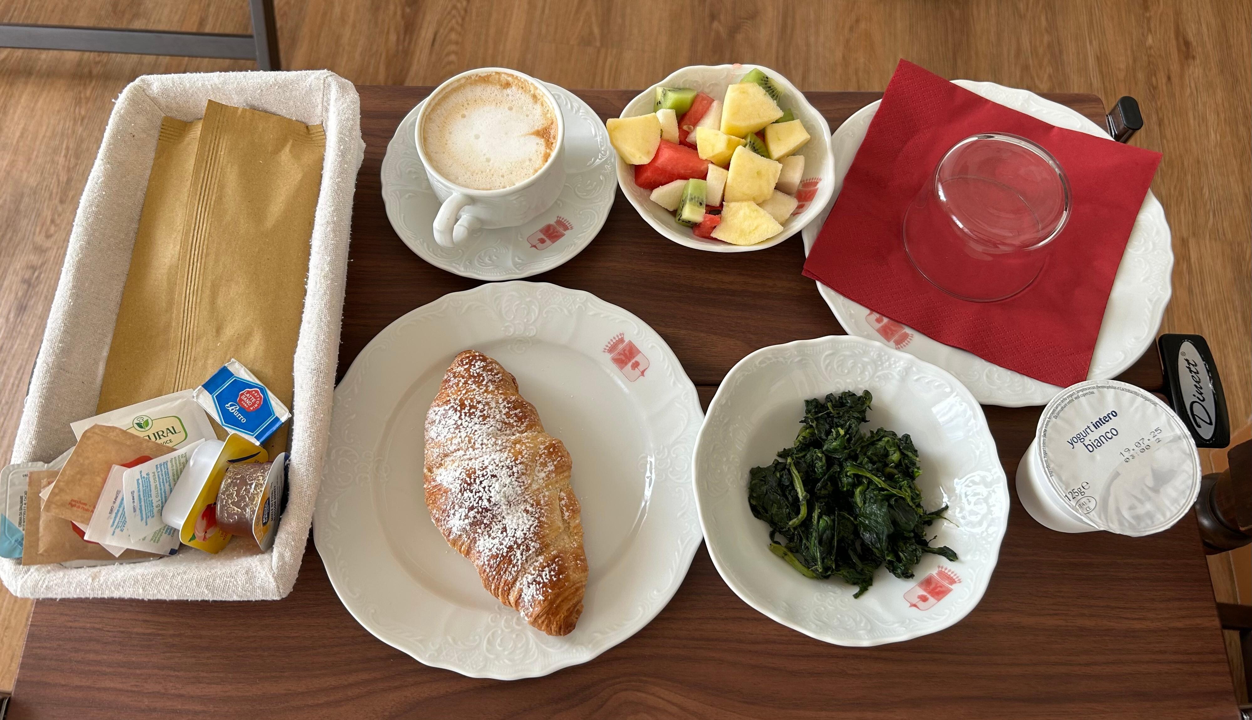 The breakfast delivered to my room - exactly what I selected: the veg, croissant, cappuccino and mixed fruit with plain yogurt and jam. Delicious!