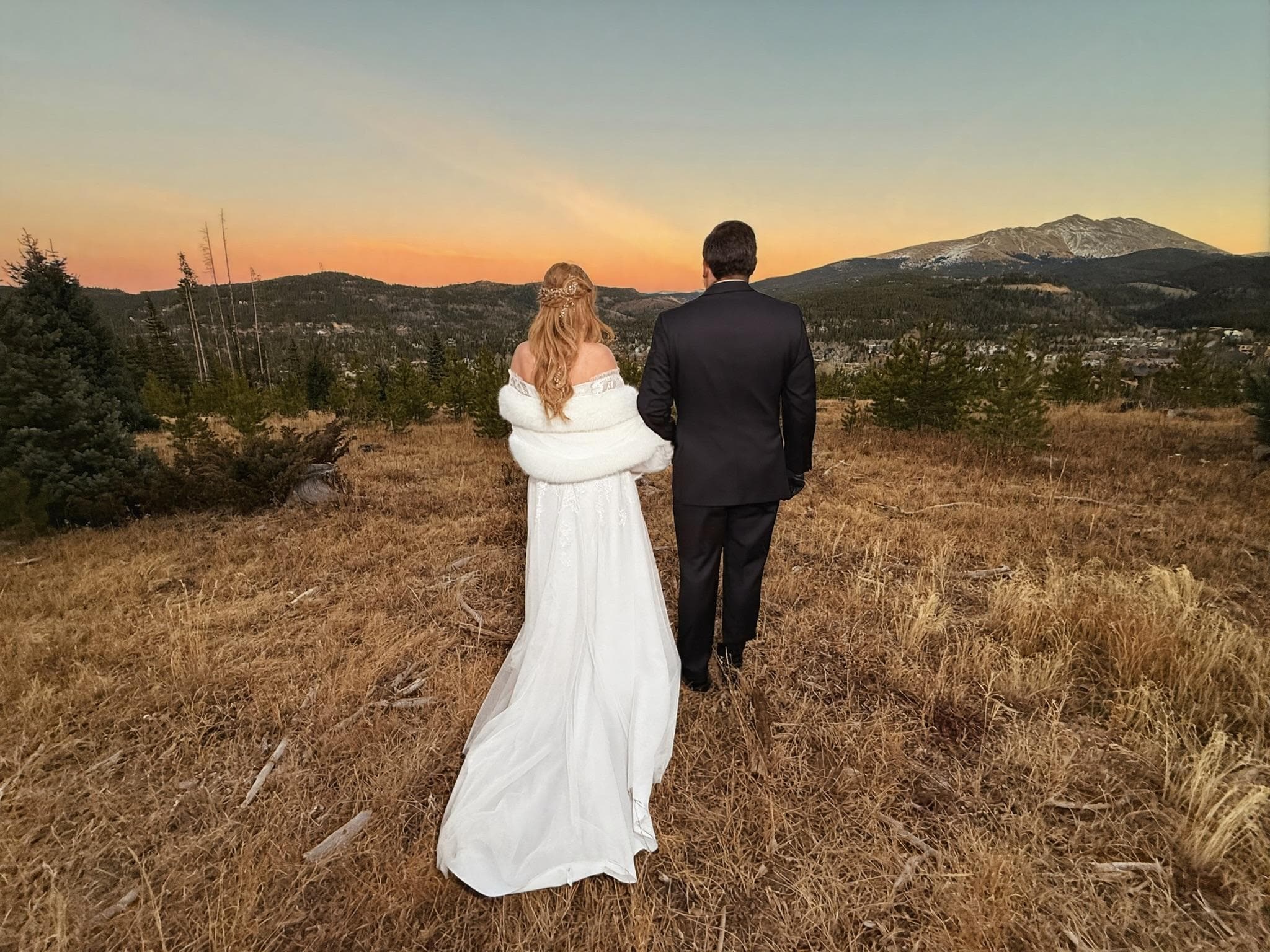 After the wedding, and before we changed clothes to go to dinner, we walked to the back of the property to get a few more pics. Breckenridge is off in the distance.