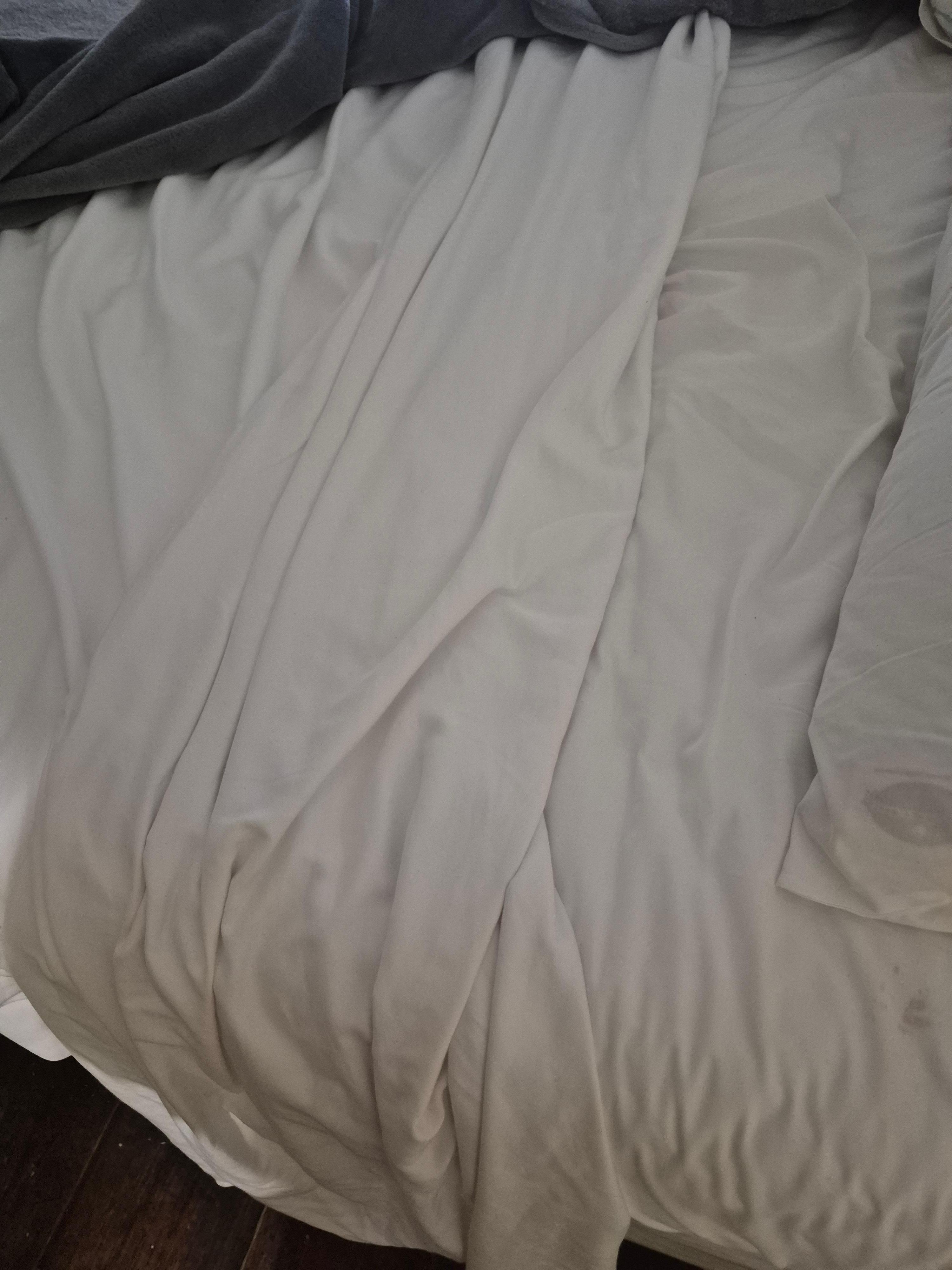 The bed after the cover was pulled down