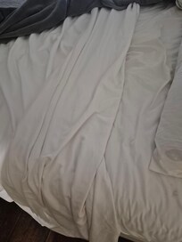 The bed after the cover was pulled down